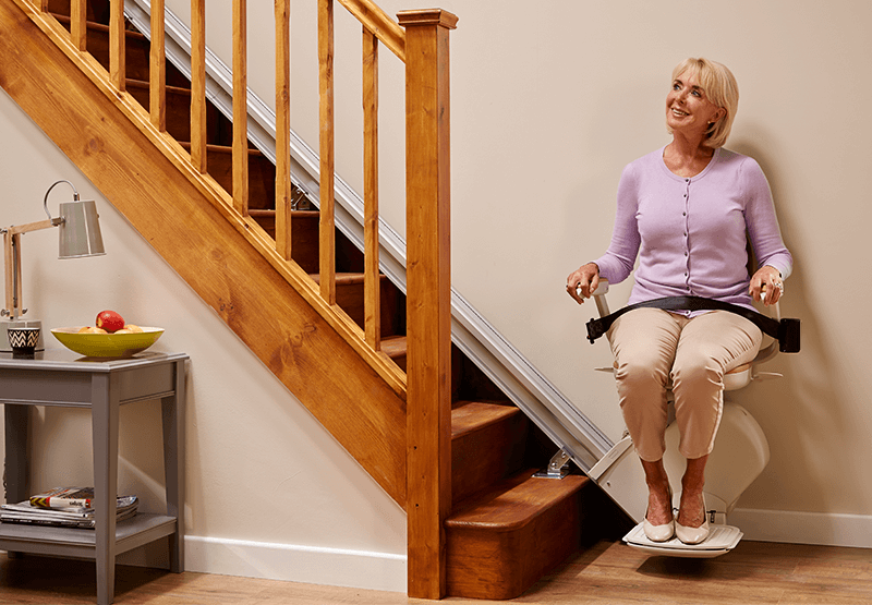 straight stairlift seated person at home